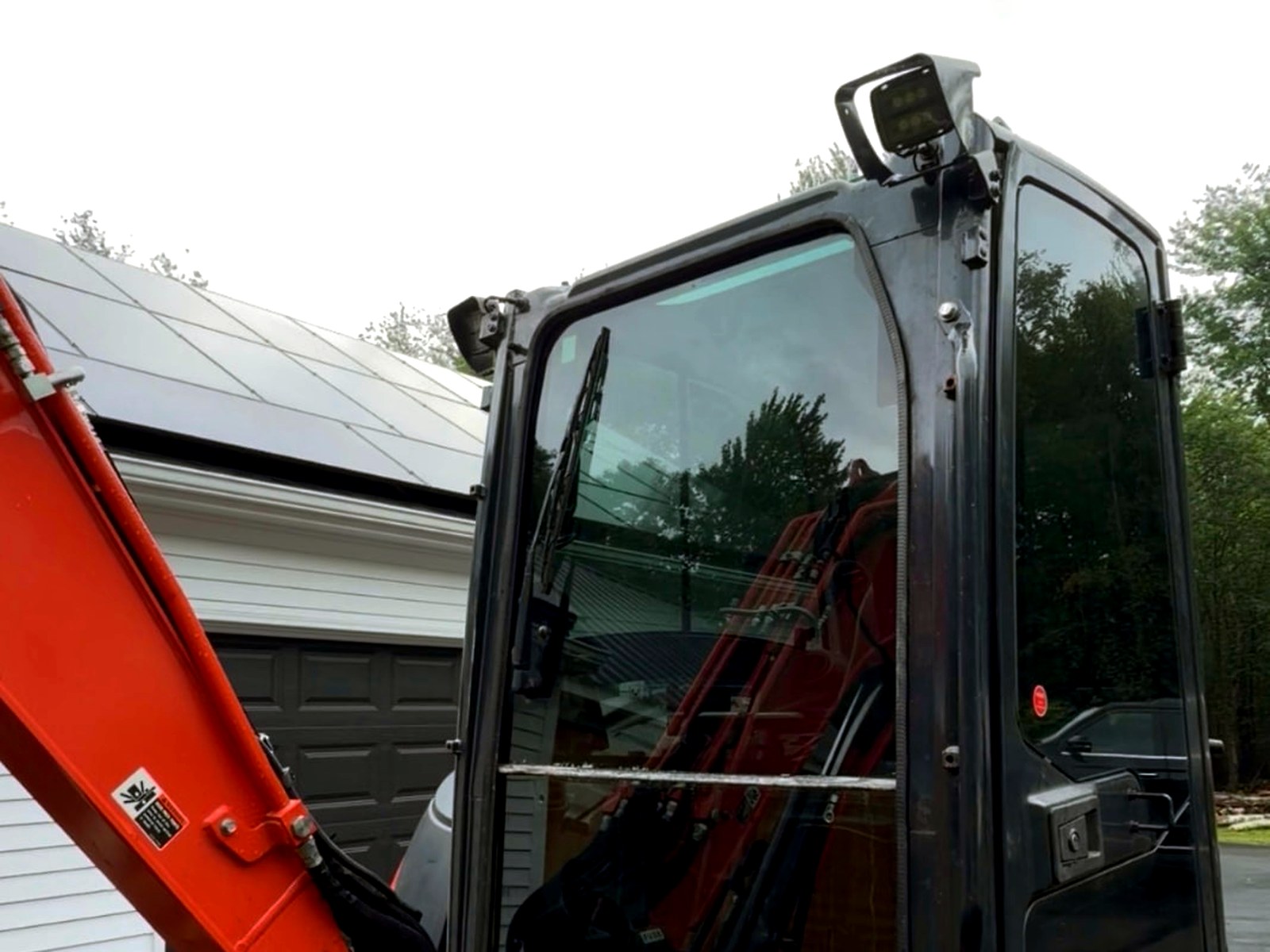 Kubota equipment cab with dark tinted glass installed at Imperial Car Tint